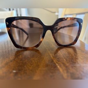Prada Large Round Tortoise Sunglasses